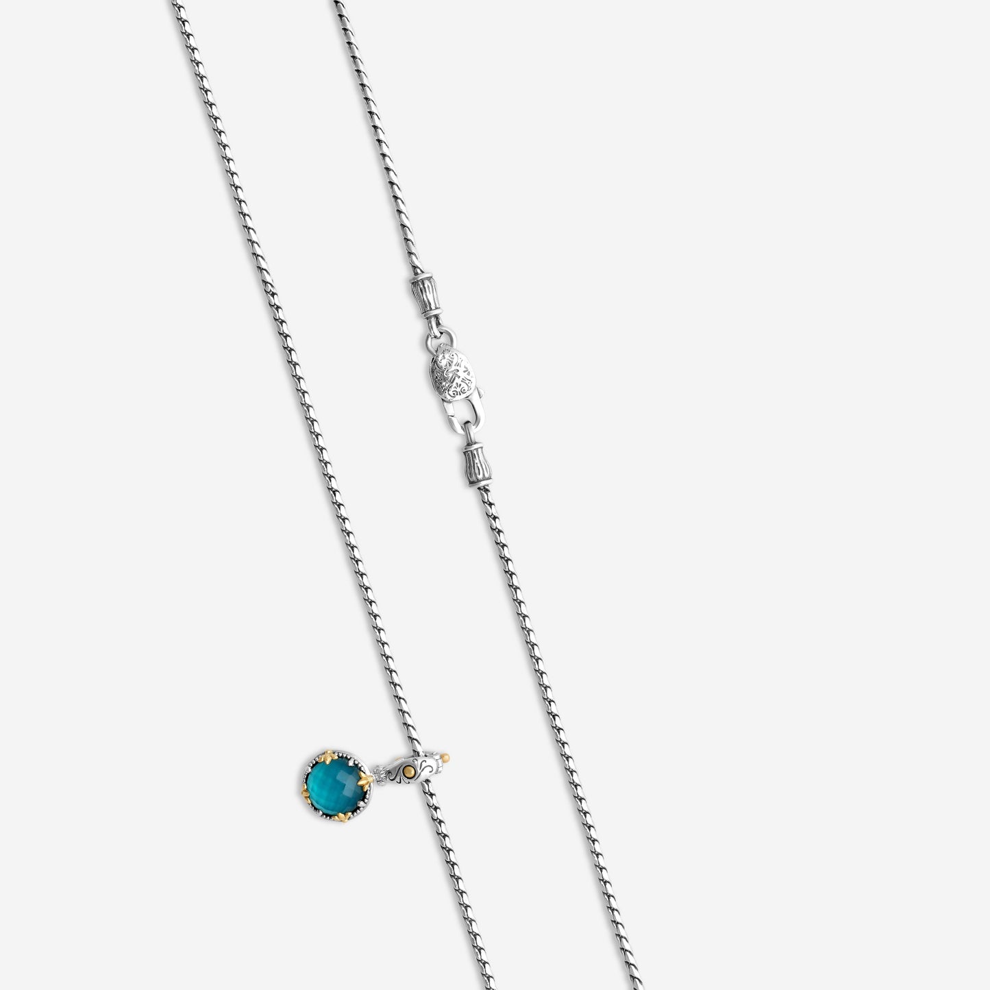 KONSTANTINO - "Gen K 2" Sterling Silver & 18k Yellow Gold, Blue Spinel Doublet Pendant (SPN: 10mm) - MEKJ764-650

Pendant Dimensions: 1.00 x 0.50 in.
S/S Chain Included:CHKJ22-131-18 (Length - 18in.)